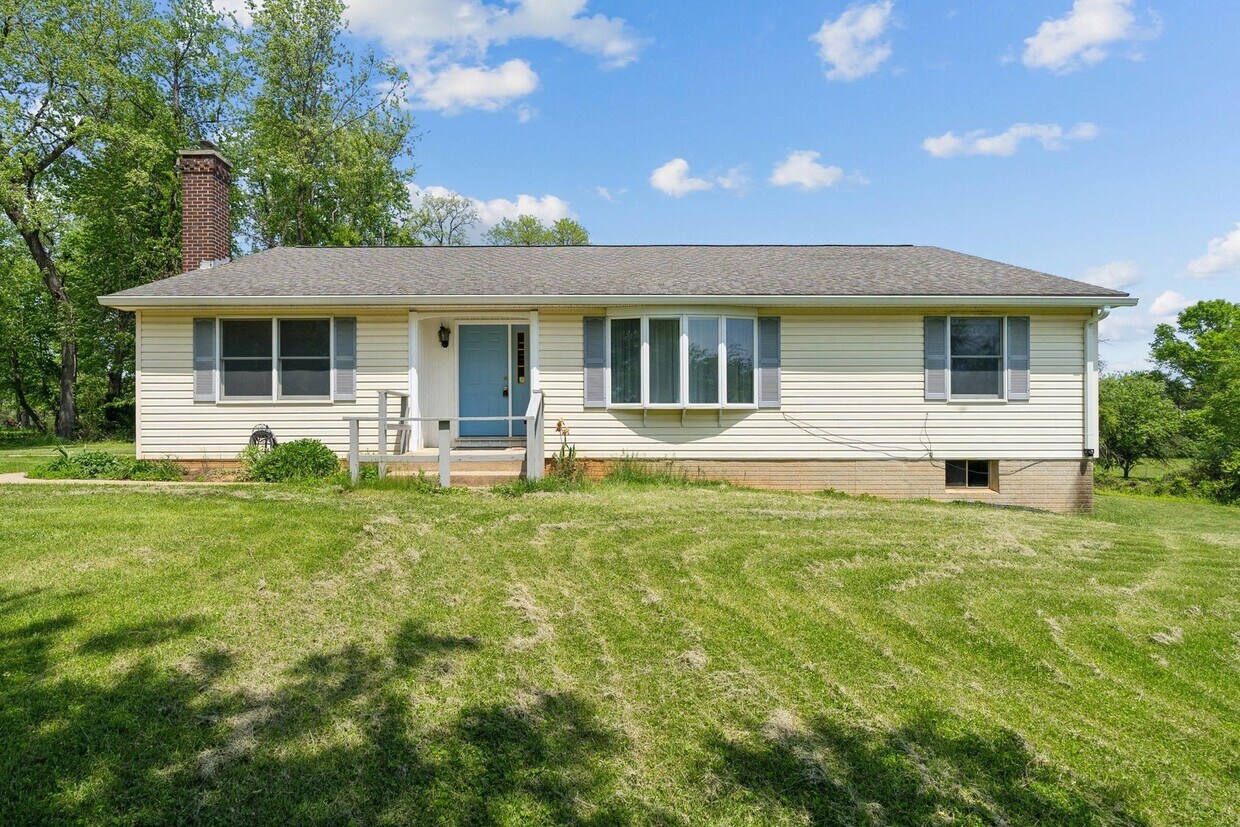 Primary Photo - Charming One-Level Home Nestled Among Matu...
