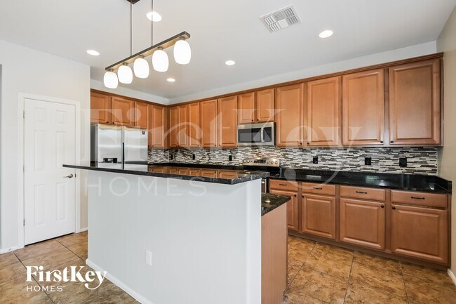 Foto del edificio - 10463 S Cutting Horse Dr