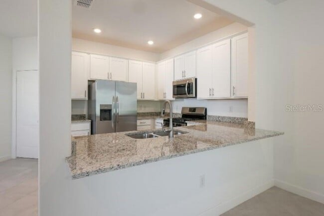 Photo - 14721 Lyla Ter Townhome