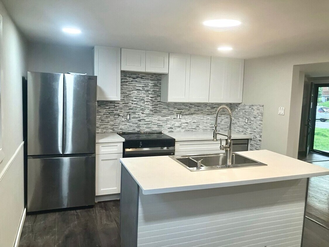 Foto del edificio - 4?bed • 2?bath • 1,458?ft² • unfurnished •...