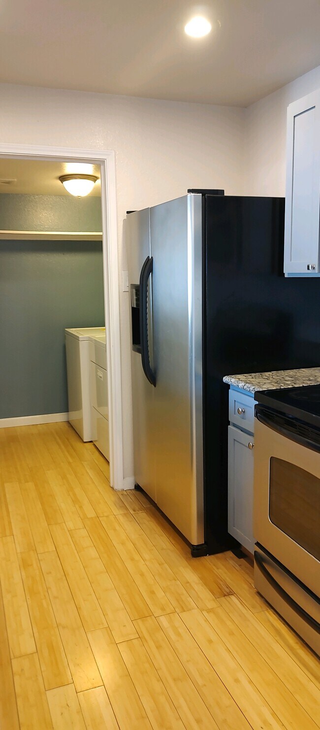 kitchen into laundry room - 1201 Glen Cove Pky