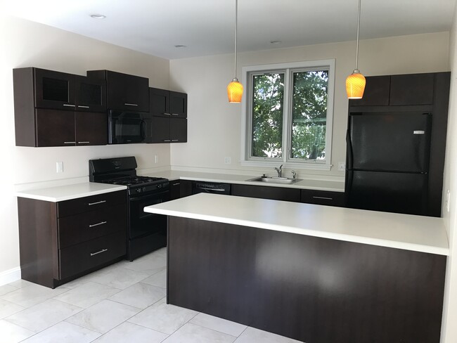 Kitchen with island - 28 Munjoy St