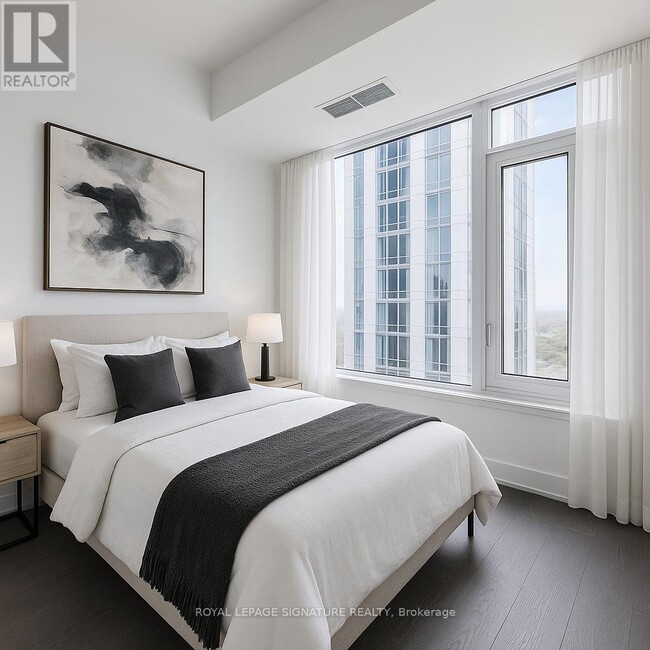 Photo du bâtiment - 11-4411 Yorkville Ave