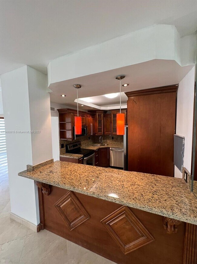 Building Photo - 5555 Collins Ave
