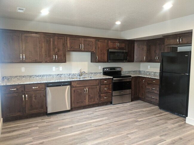 Foto del edificio - Move In & Save! | 3 Bed 2.5 Bath Townhome with Attached Garage + 2 Weeks Free