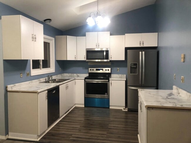 Renovated kitchen - 6049 67th Way N