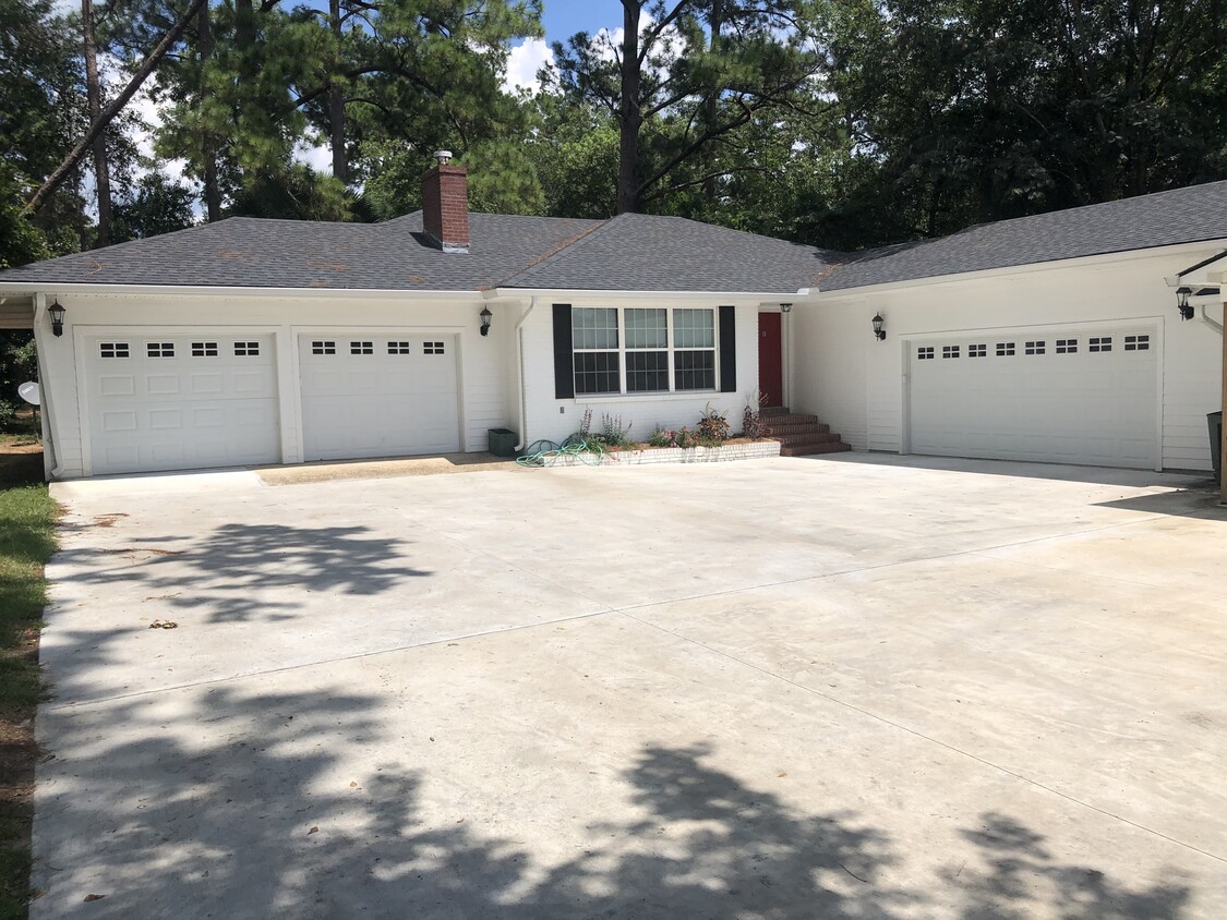 Front view and enclosed garage - 1511 Boone Dr