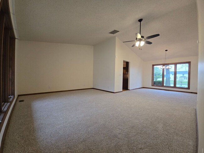 Building Photo - Charming Brick Ranch with Serene Pond Views