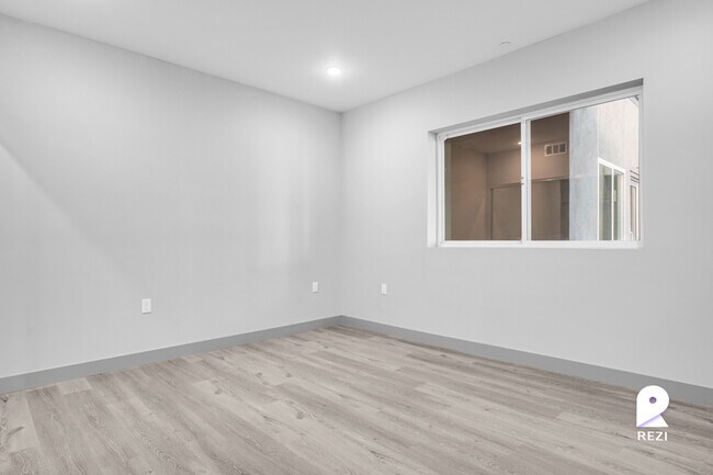 Building Photo - 7040 Woodman Ave