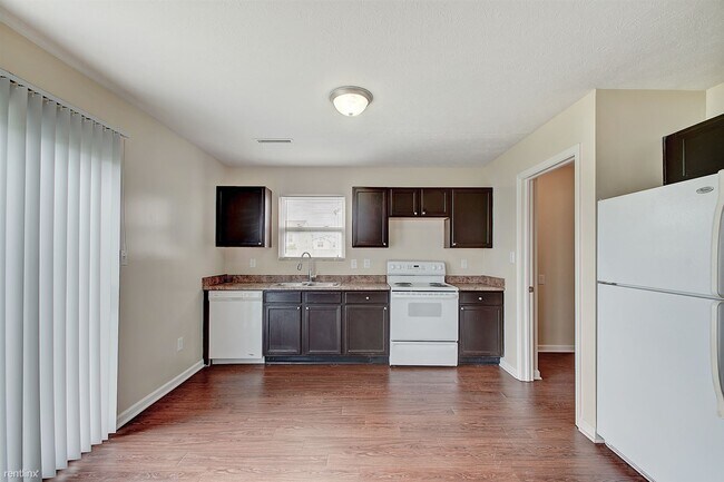 Building Photo - 4 br, 2.5 bath House - 7747 Danube Street 1