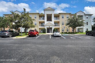 Building Photo - 8241 Pelican Landing Rd