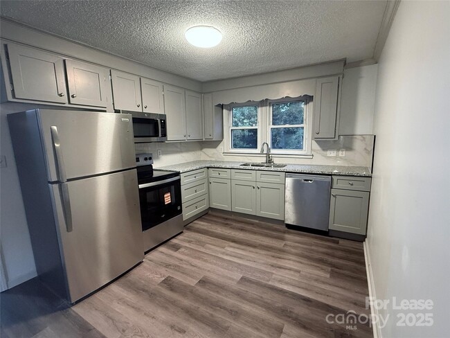 Building Photo - 9225 Moores Chapel Rd