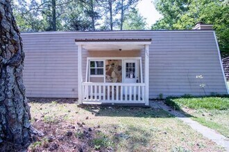 Building Photo - 205-207 Rustwood Dr