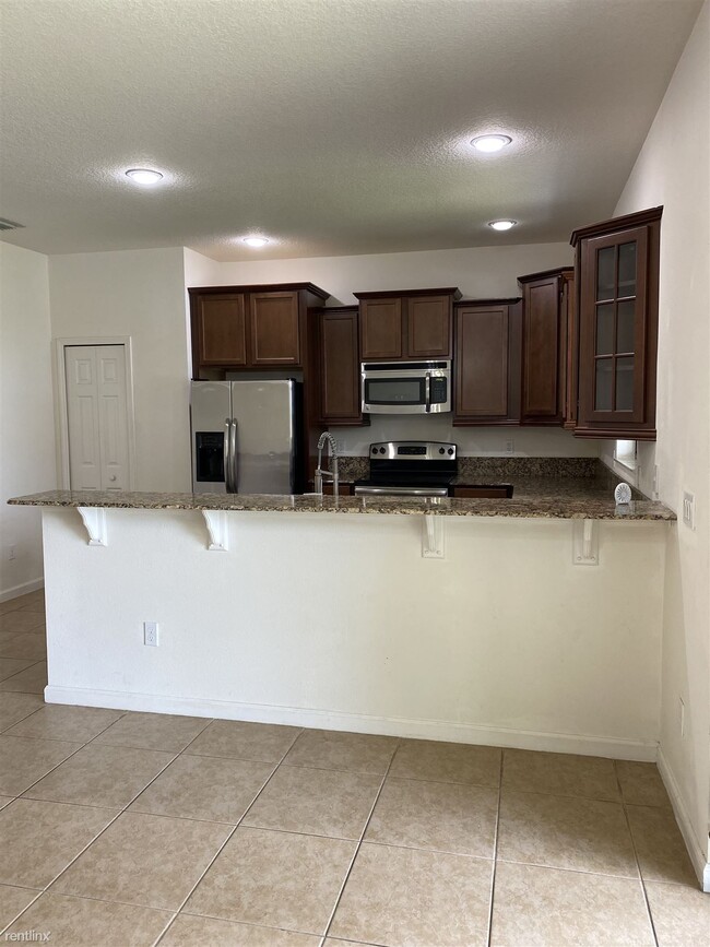 Building Photo - 4 br, 2.5 bath Townhome - 1622 Portofino M...