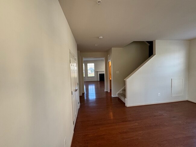 Here's the view from the front door with the dining/flex room to your right and the open floor plan. - 44520 Gray Wolf St