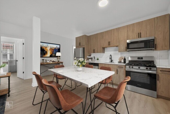 Foto del edificio - 6975 N Bell Ave