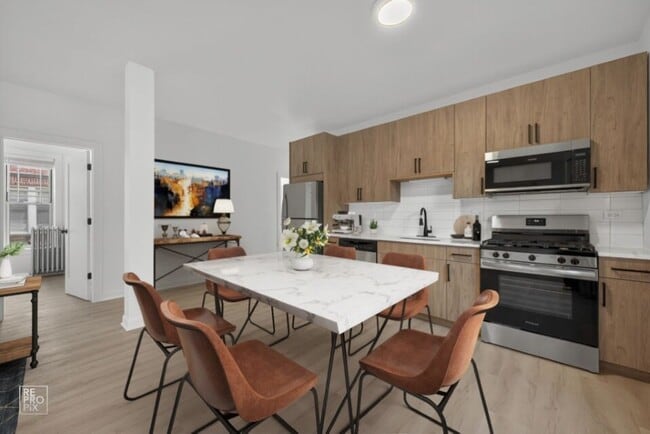 Building Photo - 6975 N Bell Ave