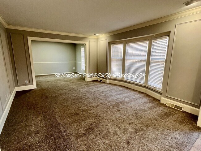 Foto del edificio - Spacious 4-Bedroom, 3-Bathroom Home with Fenced Yard and Bonus Spaces!