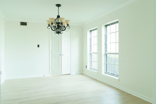 Dining room from foyer with doors leading to kitchen - 1034 Barkston Dr