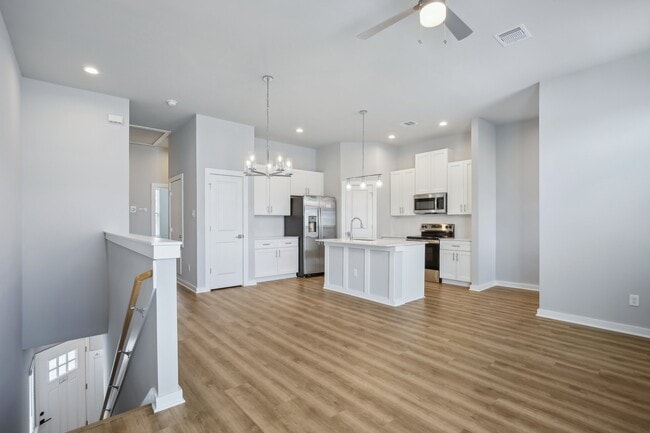 Spacious living room, dining room, kitchen, open concept. - 5701 Spring Stuebner Rd