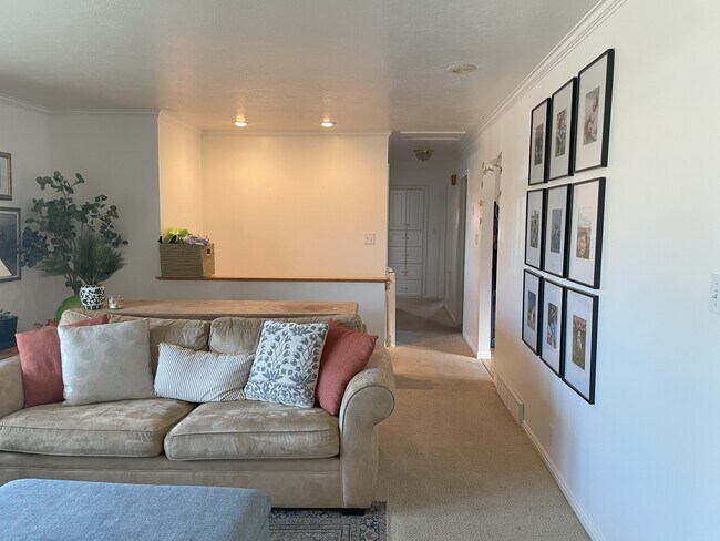 Stairwell and main floor living room and hallway to bedrooms - 29 Kingdon Ln
