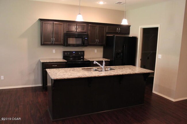 Building Photo - 5046 Raintree Cir
