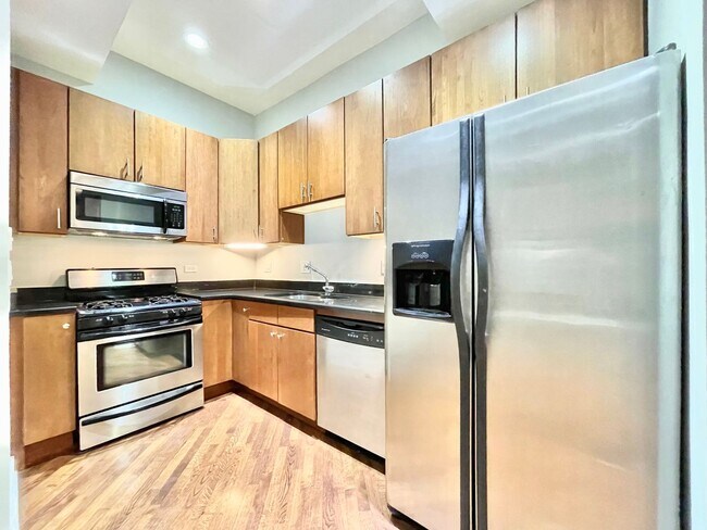 Building Photo - STEPS TO BLUE LINE -  AMAZING 2BD/2BTH DUP...