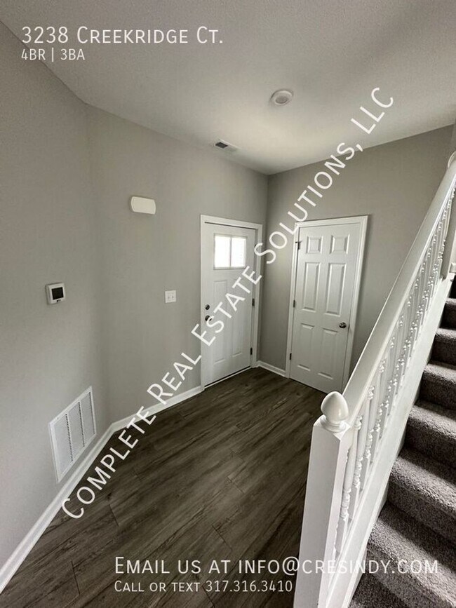 Building Photo - Now Showing this 4 BR, 2 1/2 BA home locat...