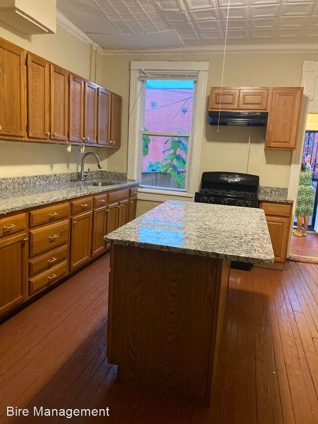 Building Photo - 3 br, 1 bath House - 2011 E Lanvale St