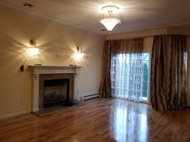 Living Room with Fireplace - 76 Conklin Ave