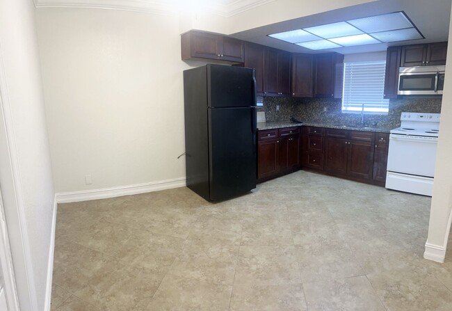 Photo - NEWLY RENOVATED UNITS WITH NEW APPLIANCE Apartment