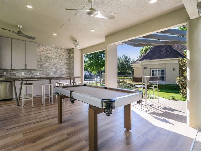 Outdoor Entertaining Space with Pool Table. - Franciscan of Arlington