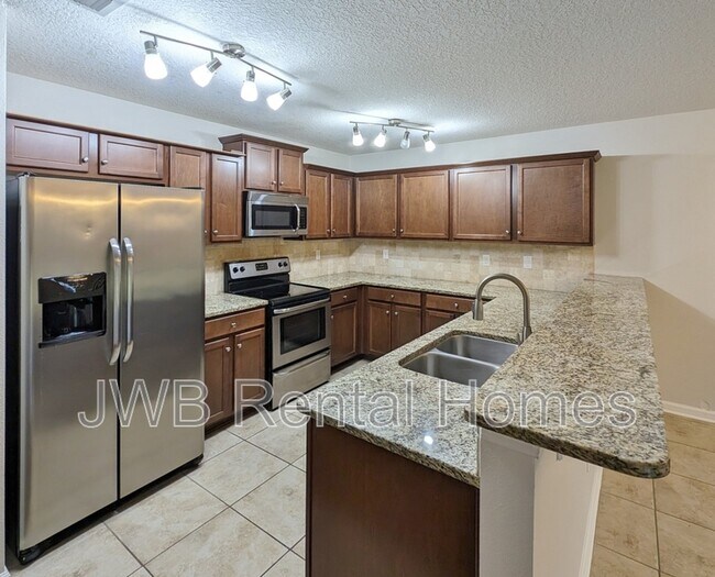 Building Photo - 6672 River Falls Drive S