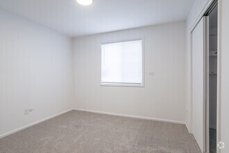 2 BR, 1 BA - The Agave - Second Bedroom - ReNew Millbrook Apartment Collection