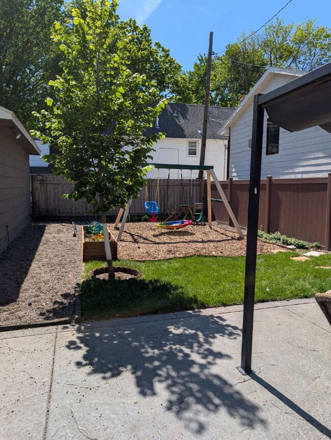 Building Photo - 3BR/2BA Northeast Minneapolis Home With Character, Privacy, and Room to Relax