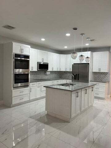 Photo - 1305 Lucaya Dr (Riviera Beach, FL)