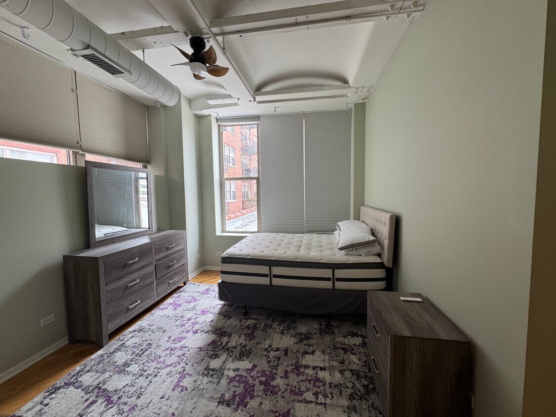 Primary Bedroom (furnished: bedroom frame and mattress new, dresser and nightstand new) - 500 S Clinton St