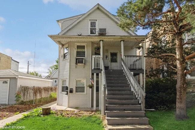 Building Photo - 5039 W Henderson St