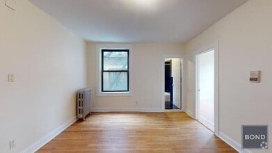 Building Photo - 207-209-209 W 11th St