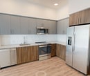 This contemporary apartment, located at 1517 H Street in Sacramento, offers a well-designed living space of 790 square feet. The single-story layout comprises two bedrooms, two bathrooms, and a thoughtfully arranged open-concept living area. The primary bedroom, measuring 120 square feet, provides ample space for comfort.

The apartment features large windows that flood the rooms with natural light, creating a bright and airy atmosphere. The modern kitchen is equipped with stainless steel appliances, including a side-by-side refrigerator, and boasts a combination of light gray upper cabinets and warm wood-toned lower cabinets. A sleek white backsplash complements the overall design.

Both bathrooms showcase modern fixtures, with at least one featuring a spacious vanity with wooden cabinetry and a large mirror. The flooring throughout the apartment alternates between plush carpeting in the bedrooms and living areas, and durable wood-look flooring in the kitchen and bathrooms.

The open floor plan allows for seamless flow between the kitchen, dining, and living areas, making the space feel larger and more connected. Each bedroom includes a closet for storage, and the apartment's neutral color palette provides a blank canvas for personalization.

Overall, this apartment offers a contemporary living experience with its modern amenities, thoughtful design, and abundance of natural light.