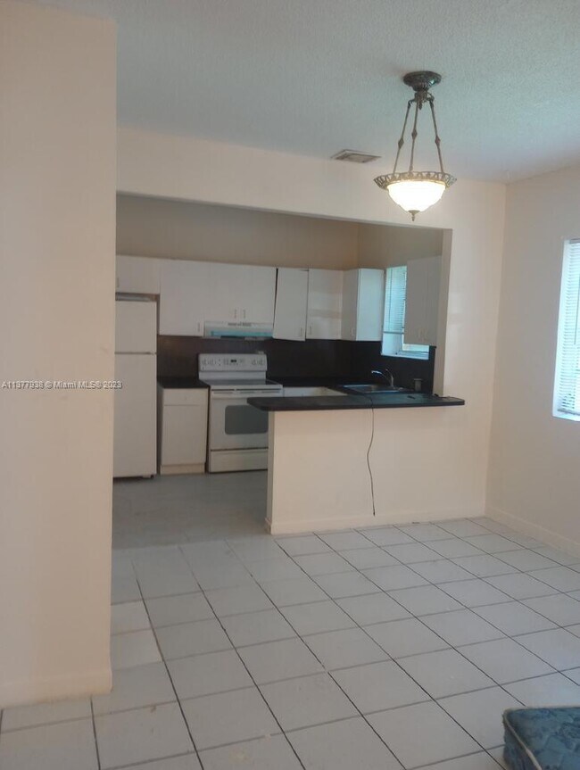 Foto del edificio - 3128 NW 13th Ave