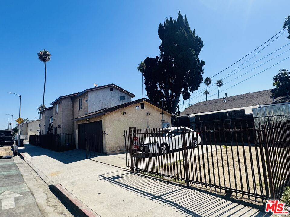 Building Photo - 7706-7706 S Grand Ave