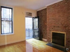 Building Photo - 102 E 7th St