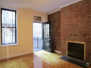 Building Photo - 102 E 7th St