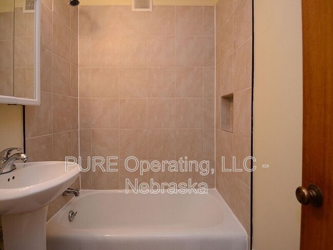 Building Photo - 210 N 32nd Av