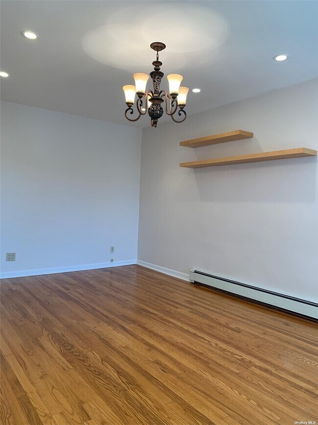 Building Photo - 76-05 Caldwell Ave