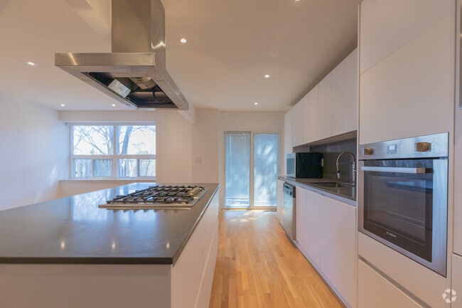 2BR + DEN, 1.5BA - 1,134SF - Kitchen - 2029-2055 Victoria Park Avenue