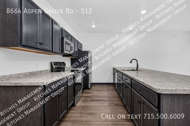 Building Photo - 8664 Aspen Ln