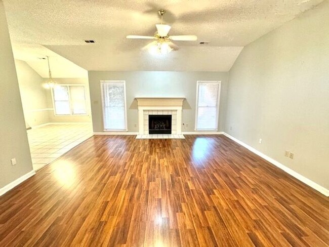 Building Photo - Now Leasing a 4-Bedroom 3 Bath Home in Cor...