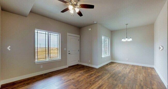 Building Photo - Eaton Oasis- Your Ultimate Modern Townhome...